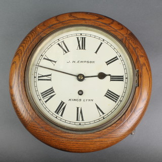 A wall clock with 8 1/2" dial with Roman numerals marked J H Empson Kings Lynn contained in an oak case
