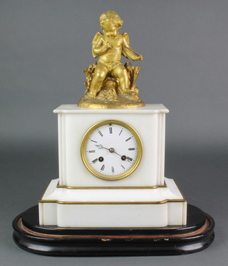 Rollin A Paris, a 19th Century French 8 day striking mantel clock with enamelled dial and Roman numerals contained in a white marble case surmounted by a gilt metal figure of a seated Cupid 