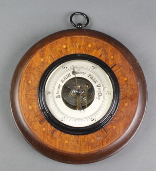 An aneroid barometer with silvered dial contained in an inlaid mahogany case 