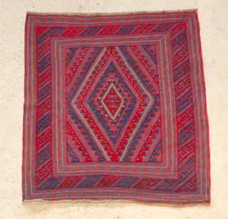 A blue and red ground Gazak rug with diamond medallion 47" x 45" 