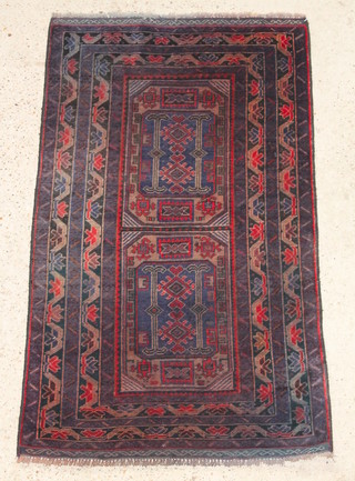 A contemporary brown and blue ground Belouche rug 55" x 34" 