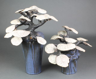A Tessa Fuchs stylised earthenware model of a tree 15", a smaller ditto 10" in a fitted case 