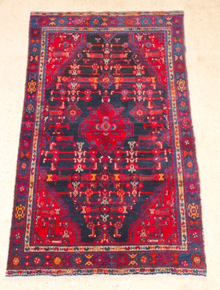 A Persian red and blue ground Brojerd rug 49" x 79" 