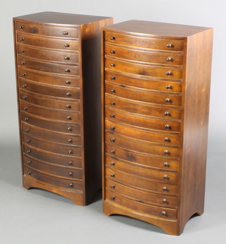 A pair of Victorian style mahogany bow front chests of 14 shallow drawers, raised on bracket feet 36 1/2"h x 17"w x 12"d 