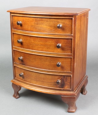 A Victorian style mahogany apprentice chest of 4 long drawers with tore handles, raised on bracket feet 16"h x 12"w x 9" 
