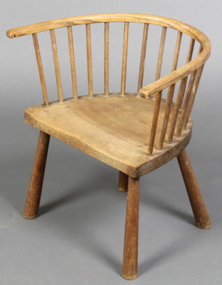 A child's elm stick and tub back chair, raised on turned supports 17"h x 16 1/2"w x 10"d  