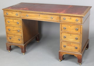 A Victorian mahogany pedestal desk with red inset writing surface above 1 long and 8 short drawers, 29 1/2"h x 53"w x 24"d 