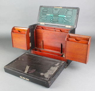 An Edwardian mahogany writing slope/stationery box with fall front, the interior fitted a stationery rack contained in a black leather finished case 9"h x 12"w x 5 1/2"d 