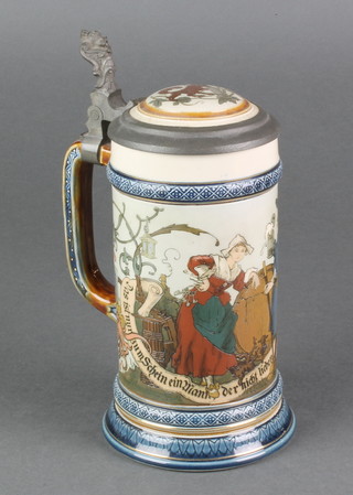 A Mettlach tankard, the body decorated with revellers, having pewter mounts, stamped 2230 8" 