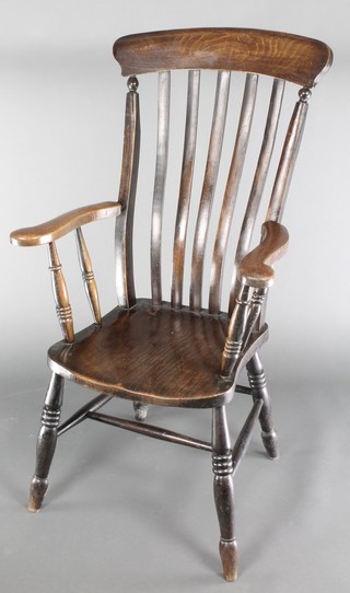A 19th Century elm stick and bar back Windsor chair with solid seat and H framed stretcher 