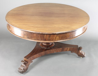 A Victorian circular oval extending table, raised on a turned column and triform base with scroll feet 22"h 