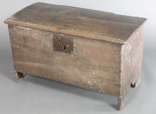 A 17th/18th Century coffer of plank construction with hinged lid, long iron hinges and iron lock 18"h x 31"w x 16 1/2"d 