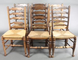 A harlequin set of 6 elm ladder back dining chairs with woven rush seats, raised on club supports with H framed stretchers 