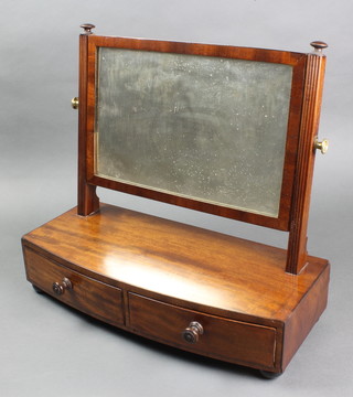 A 19th Century rectangular plate dressing table mirror contained in a mahogany swing frame with bow front base fitted 2 drawers 16"h x 19"w x 8"d  