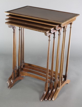 An Edwardian quartetto of rectangular interfitting tables raised on turned supports 28 1/2"h x 23"w x 15"d, 27 1/2" x 20"w x 13 1/2", 26 1/2"h x 18"w x 13"d, 26"h x 16"w x 12"d 