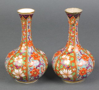 A pair of 19th Century Derby Stevenson Hancock baluster vases with elongated necks, decorated with floral scrolling flowers 6" 