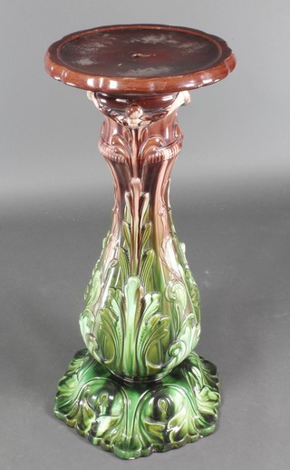 An art nouveau green/brown glazed jardiniere stand 32 1/2"