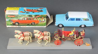 A Lucky Japanese plastic model of a Vauxhall Victor 101 estate car together with a 1977 Corgi model of the State Landau 