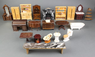 A collection of dolls house furniture 