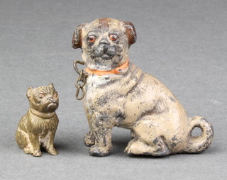 A cold painted bronze figure of a seated "pug" 1" and a metal figure of a pug 1 1/2" 