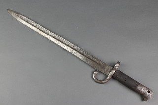 A 19th Century bayonet with 18" blade,  pitted and missing spring 