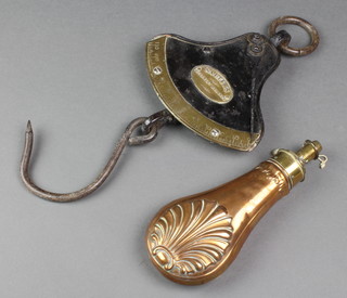 A copper and brass powder flask with shell decoration, the spout marked Dams 8" (split to the side) together with a Salters Quadrant balance 