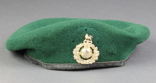 A Royal Marine green beret by Compton Webb complete with staybright badge 