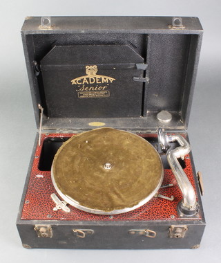 An Academy Senior portable manual gramophone contained in a black fibre case (handle missing)
