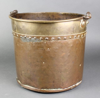 A copper and brass coal bin with swing handle 12"h x 13 1/2"w 