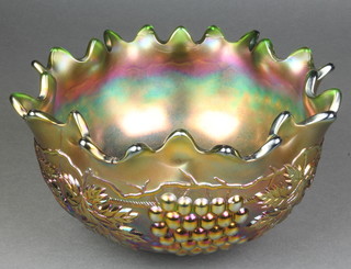 A purple Carnival Glass punch bowl with vinous decoration 10" 