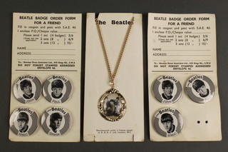 4 Beatles badges on card, 3 other Beatles badges on card and a The Beatles necklet on chain 