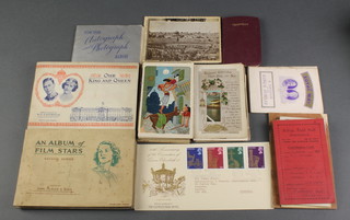 A 1931 Highway Code, 2 1953 Coronation maps together with a Regent Street pass for Coronation Day, various cigarette card albums and postcards 