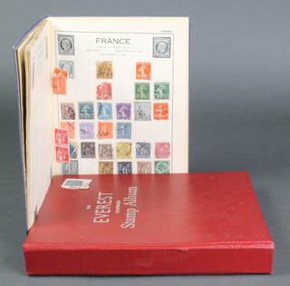 A 1930's Victory stamp album and various 1930's and later stamps together with an Everest stamp album 