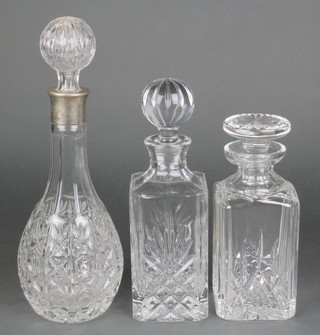 A cut glass square spirit decanter and stopper 8 1/2" and 2 others 