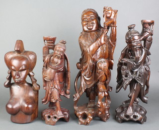 A Chinese carved hardwood figure of a standing deity the eyes set hardstones 19" and 2 others 17" (chip to the top) and 14" and an African carved hardwood bust 14" 
