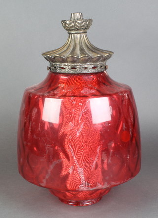 A cranberry glass light shade with metal mounts 15"h x 11" diam.  