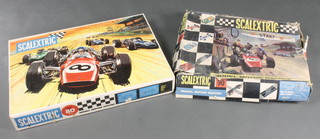 A Scalextric Grand Prix 80 set, boxed (missing cars) and a ditto 90 set and various cars, mostly f