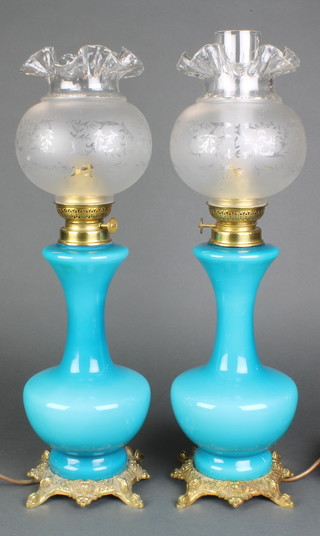 A pair of Victorian gilt metal mounted turquoise table lamps with frosted shades 12" 