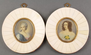 20th Century watercolours, portrait miniatures of ladies, a pair, in piano key oval frames 2 1/2" x 2" 
