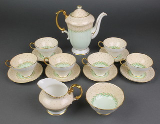 A Paragon tea set with pink and green decoration with gilt borders comprising teapot, 6 tea cups, 6 saucers, milk jug and sugar bowl 