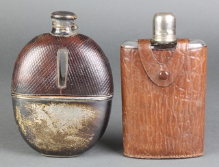 A large Victorian silver mounted leather flattened hip flask, Birmingham 1888 7", a silver plated mounted ditto 