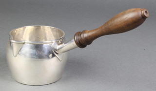 A silver brandy warmer with turned wood handle, the base bearing hallmarks 