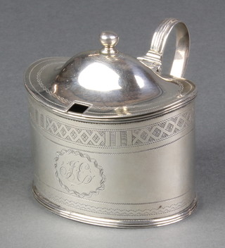A Georgian silver oval Adam style mustard pot with blue glass liner, London 1904