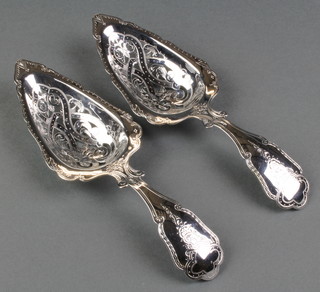 A pair of Victorian silver sifter spoons with chased decoration Edinburgh 1882 100 grams