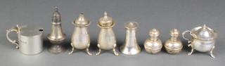 A silver mustard pot, London 1939 and 7 other condiments, 252 grams