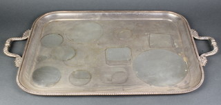 A silver plated 2 handled rounded rectangular tray with gadrooned rim 30"