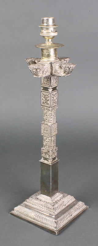 A South American silver plated candlestick with stylised floral motifs, converted to electricity 14" 