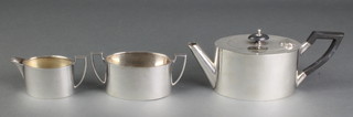 An Art Deco oval silver plated ebony mounted Bachelor's 3 piece tea set 