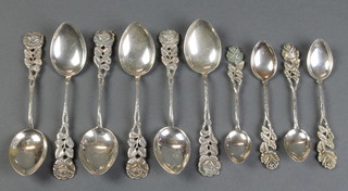 A set of 6 German 800 fancy teaspoons and 4 ditto coffee spoons with floral handles 117 grams 