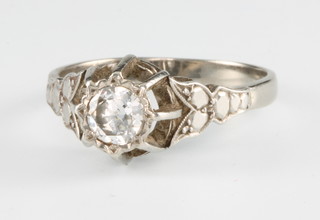 A white gold high mount single stone diamond ring, size R